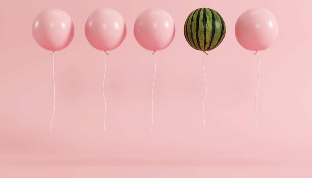 outstanding balloon watermelon concept on pastel pink background for copyspace. minimal concept.